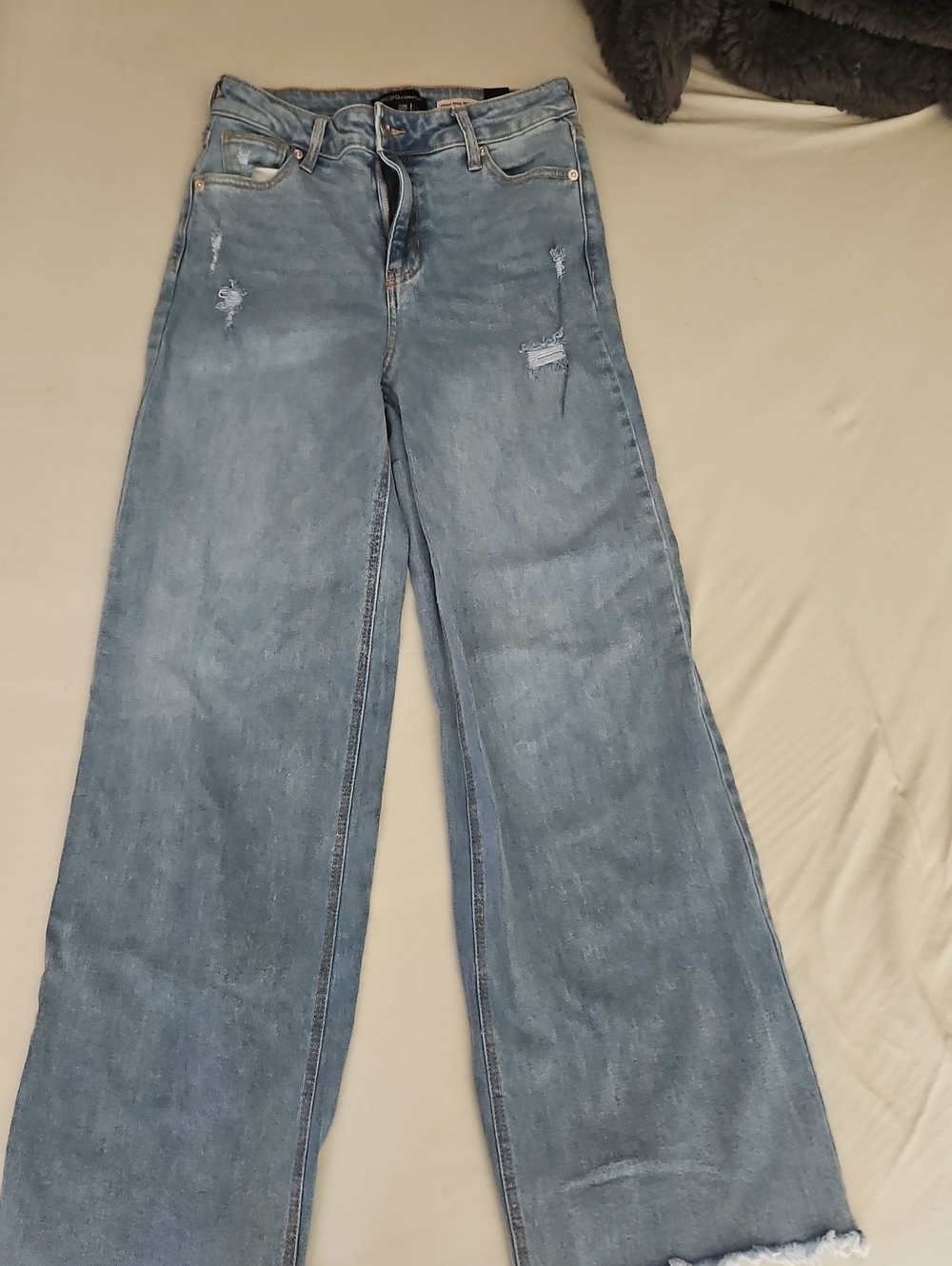 BCBGeneration Light Blue Wide Leg Jeans with Subtle Distress